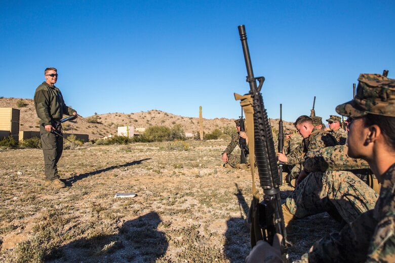 U.S. Marines and Sailors stationed on Marine Corps Air Station (MCAS) Yuma participate in "Operation Backbone" in Yuma, Ariz., Feb. 7, 2019. Operation Backbone is a quarterly unit exercise meant to strengthen the warrior's spirit in the non-commisioned officers (NCOs) and promote cohesion between them. The exercise consisted of a hike with the Headquarters and Headquarters Squadron (H&HS)  commanding officer and acting sergeant major, several classes, and a warriors night. Classes included simulated room clearing training, terrain model training, improvised explosive devices (IED) training, and the Family Advocacy Program on station sent out a representative to talk to the NCOs about leadership. (U.S. Marine Corps photo by Cpl. Isaac D. Martinez)