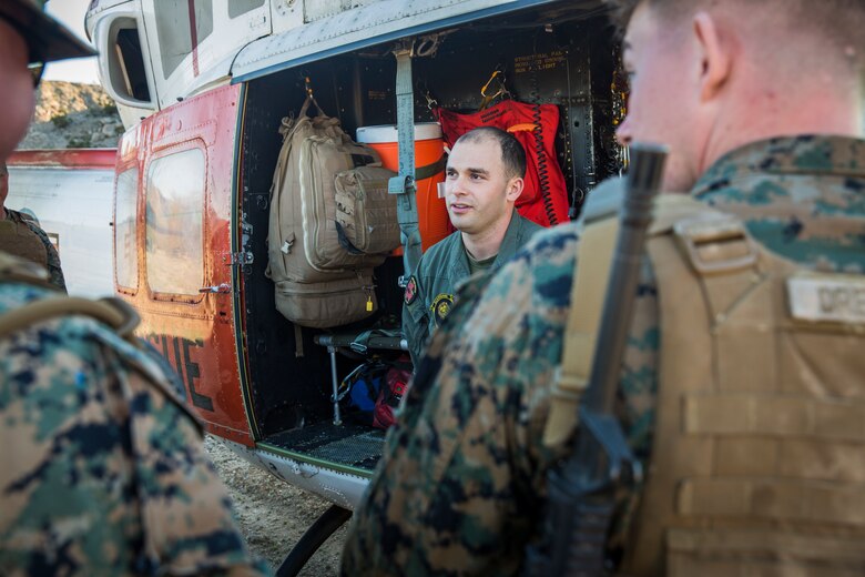 U.S. Marines and Sailors stationed on Marine Corps Air Station (MCAS) Yuma participate in "Operation Backbone" in Yuma, Ariz., Feb. 7, 2019. Operation Backbone is a quarterly unit exercise meant to strengthen the warrior's spirit in the non-commisioned officers (NCOs) and promote cohesion between them. The exercise consisted of a hike with the Headquarters and Headquarters Squadron (H&HS)  commanding officer and acting sergeant major, several classes, and a warriors night. Classes included simulated room clearing training, terrain model training, improvised explosive devices (IED) training, and the Family Advocacy Program on station sent out a representative to talk to the NCOs about leadership. (U.S. Marine Corps photo by Cpl. Isaac D. Martinez)