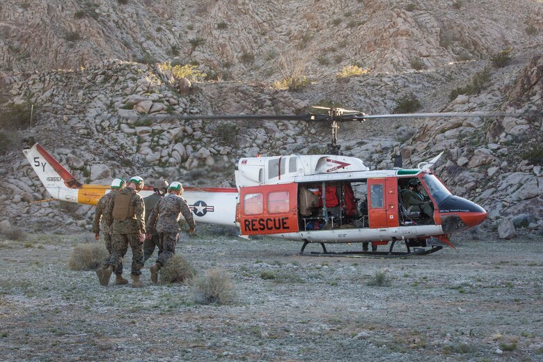 U.S. Marines and Sailors stationed on Marine Corps Air Station (MCAS) Yuma participate in "Operation Backbone" in Yuma, Ariz., Feb. 7, 2019. Operation Backbone is a quarterly unit exercise meant to strengthen the warrior's spirit in the non-commisioned officers (NCOs) and promote cohesion between them. The exercise consisted of a hike with the Headquarters and Headquarters Squadron (H&HS)  commanding officer and acting sergeant major, several classes, and a warriors night. Classes included simulated room clearing training, terrain model training, improvised explosive devices (IED) training, and the Family Advocacy Program on station sent out a representative to talk to the NCOs about leadership. (U.S. Marine Corps photo by Cpl. Isaac D. Martinez)