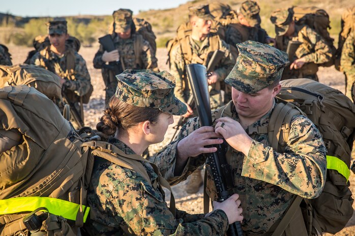 U.S. Marines and Sailors stationed on Marine Corps Air Station (MCAS) Yuma participate in "Operation Backbone" in Yuma, Ariz., Feb. 7, 2019. Operation Backbone is a quarterly unit exercise meant to strengthen the warrior's spirit in the non-commisioned officers (NCOs) and promote cohesion between them. The exercise consisted of a hike with the Headquarters and Headquarters Squadron (H&HS)  commanding officer and acting sergeant major, several classes, and a warriors night. Classes included simulated room clearing training, terrain model training, improvised explosive devices (IED) training, and the Family Advocacy Program on station sent out a representative to talk to the NCOs about leadership. (U.S. Marine Corps photo by Cpl. Isaac D. Martinez)