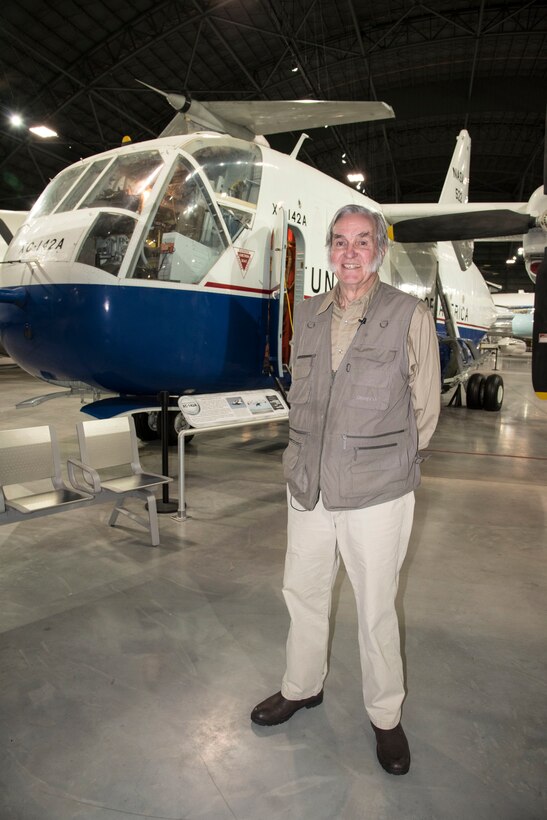 DAYTON, Ohio -- Elbert L. “Burt” Rutan's first job out of college was working as a civilian flight test project engineer with the USAF at Edwards Air Force Base. He and the team explored the suitability of Vertical/Short TakeOff and Landing (VSTOL) transports. Here Rutan poses with the Chance-Vought/LTV XC-142A on Feb 21, 2019. (U.S. Air Force photo by Ken LaRock)