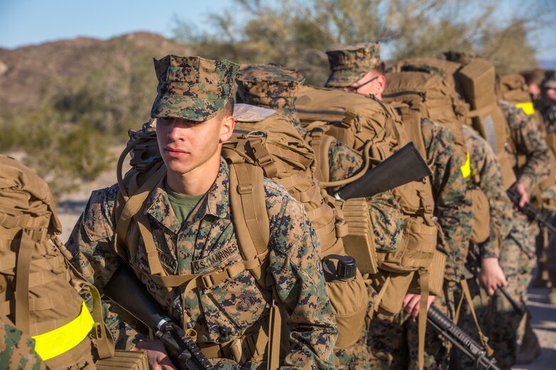 U.S. Marines and Sailors stationed on Marine Corps Air Station (MCAS) Yuma participate in "Operation Backbone" in Yuma, Ariz., Feb. 7, 2019. Operation Backbone is a quarterly unit exercise meant to strengthen the warrior's spirit in the non-commisioned officers (NCOs) and promote cohesion between them. The exercise consisted of a hike with the Headquarters and Headquarters Squadron (H&HS)  commanding officer and acting sergeant major, several classes, and a warriors night. Classes included simulated room clearing training, terrain model training, improvised explosive devices (IED) training, and the Family Advocacy Program on station sent out a representative to talk to the NCOs about leadership. (U.S. Marine Corps photo by Cpl. Isaac D. Martinez)