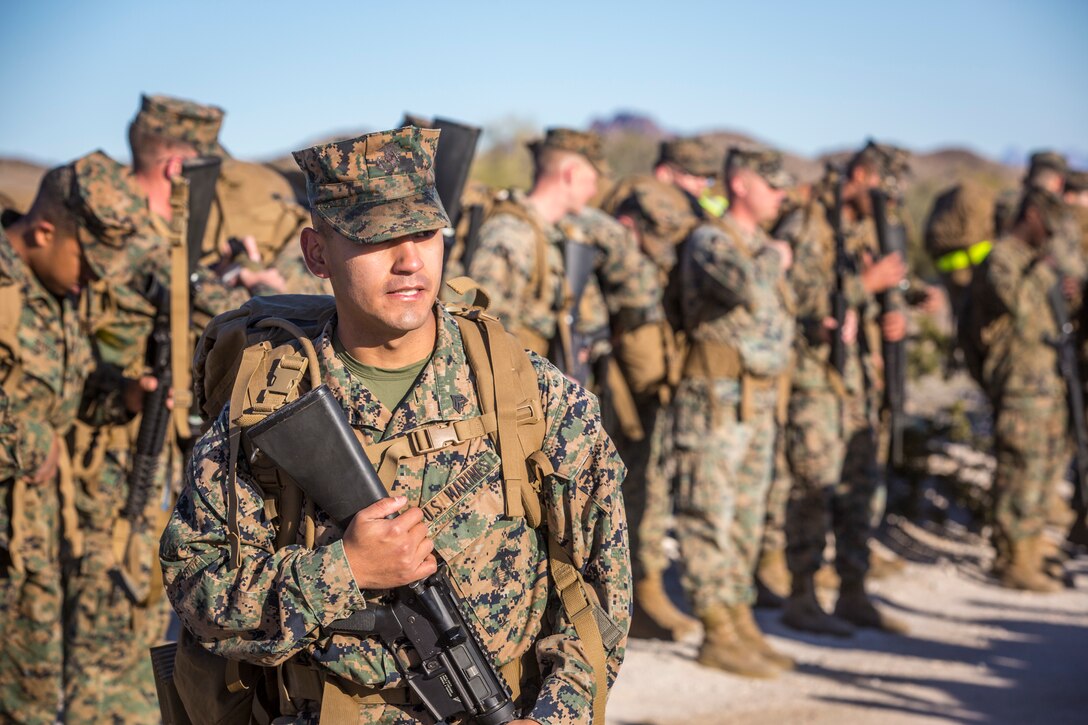 U.S. Marines and Sailors stationed on Marine Corps Air Station (MCAS) Yuma participate in "Operation Backbone" in Yuma, Ariz., Feb. 7, 2019. Operation Backbone is a quarterly unit exercise meant to strengthen the warrior's spirit in the non-commisioned officers (NCOs) and promote cohesion between them. The exercise consisted of a hike with the Headquarters and Headquarters Squadron (H&HS)  commanding officer and acting sergeant major, several classes, and a warriors night. Classes included simulated room clearing training, terrain model training, improvised explosive devices (IED) training, and the Family Advocacy Program on station sent out a representative to talk to the NCOs about leadership. (U.S. Marine Corps photo by Cpl. Isaac D. Martinez)