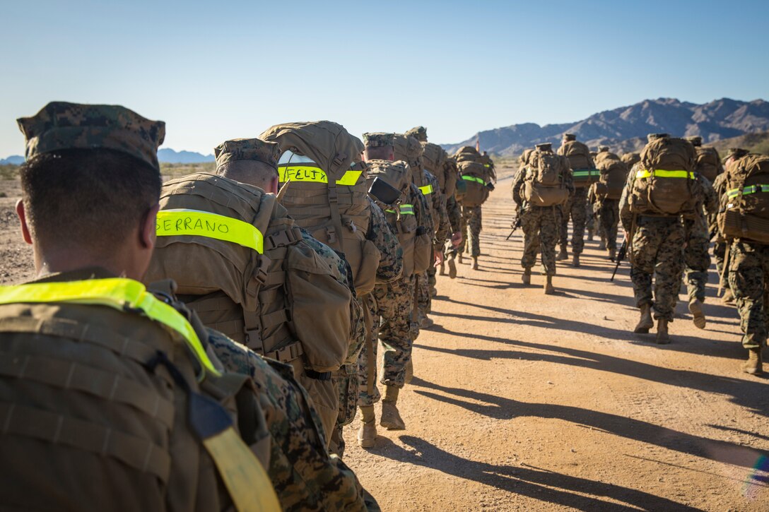 U.S. Marines and Sailors stationed on Marine Corps Air Station (MCAS) Yuma participate in "Operation Backbone" in Yuma, Ariz., Feb. 7, 2019. Operation Backbone is a quarterly unit exercise meant to strengthen the warrior's spirit in the non-commisioned officers (NCOs) and promote cohesion between them. The exercise consisted of a hike with the Headquarters and Headquarters Squadron (H&HS)  commanding officer and acting sergeant major, several classes, and a warriors night. Classes included simulated room clearing training, terrain model training, improvised explosive devices (IED) training, and the Family Advocacy Program on station sent out a representative to talk to the NCOs about leadership. (U.S. Marine Corps photo by Cpl. Isaac D. Martinez)