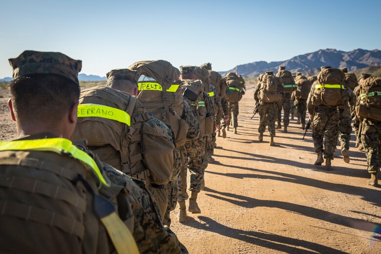 U.S. Marines and Sailors stationed on Marine Corps Air Station (MCAS) Yuma participate in "Operation Backbone" in Yuma, Ariz., Feb. 7, 2019. Operation Backbone is a quarterly unit exercise meant to strengthen the warrior's spirit in the non-commisioned officers (NCOs) and promote cohesion between them. The exercise consisted of a hike with the Headquarters and Headquarters Squadron (H&HS)  commanding officer and acting sergeant major, several classes, and a warriors night. Classes included simulated room clearing training, terrain model training, improvised explosive devices (IED) training, and the Family Advocacy Program on station sent out a representative to talk to the NCOs about leadership. (U.S. Marine Corps photo by Cpl. Isaac D. Martinez)