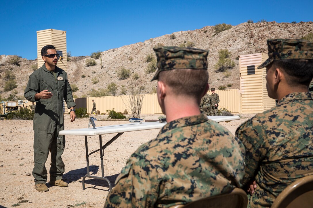 U.S. Marines and Sailors stationed on Marine Corps Air Station (MCAS) Yuma participate in "Operation Backbone" in Yuma, Ariz., Feb. 7, 2019. Operation Backbone is a quarterly unit exercise meant to strengthen the warrior's spirit in the non-commisioned officers (NCOs) and promote cohesion between them. The exercise consisted of a hike with the Headquarters and Headquarters Squadron (H&HS)  commanding officer and acting sergeant major, several classes, and a warriors night. Classes included simulated room clearing training, terrain model training, improvised explosive devices (IED) training, and the Family Advocacy Program on station sent out a representative to talk to the NCOs about leadership. (U.S. Marine Corps photo by Cpl. Isaac D. Martinez)
