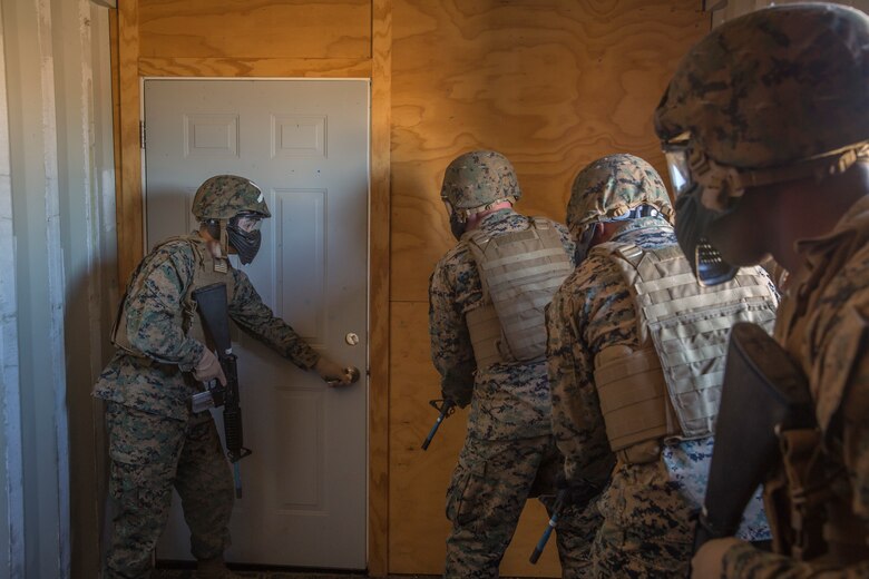 U.S. Marines and Sailors stationed on Marine Corps Air Station (MCAS) Yuma participate in "Operation Backbone" in Yuma, Ariz., Feb. 7, 2019. Operation Backbone is a quarterly unit exercise meant to strengthen the warrior's spirit in the non-commisioned officers (NCOs) and promote cohesion between them. The exercise consisted of a hike with the Headquarters and Headquarters Squadron (H&HS)  commanding officer and acting sergeant major, several classes, and a warriors night. Classes included simulated room clearing training, terrain model training, improvised explosive devices (IED) training, and the Family Advocacy Program on station sent out a representative to talk to the NCOs about leadership. (U.S. Marine Corps photo by Cpl. Isaac D. Martinez)