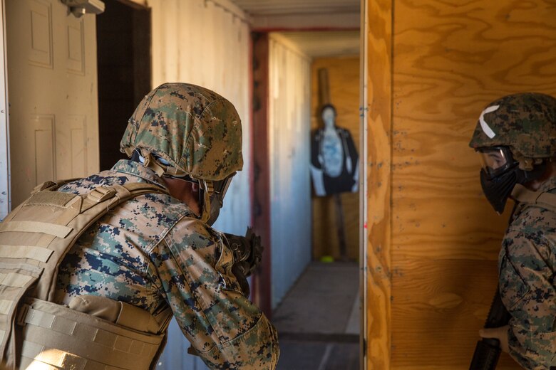 U.S. Marines and Sailors stationed on Marine Corps Air Station (MCAS) Yuma participate in "Operation Backbone" in Yuma, Ariz., Feb. 7, 2019. Operation Backbone is a quarterly unit exercise meant to strengthen the warrior's spirit in the non-commisioned officers (NCOs) and promote cohesion between them. The exercise consisted of a hike with the Headquarters and Headquarters Squadron (H&HS)  commanding officer and acting sergeant major, several classes, and a warriors night. Classes included simulated room clearing training, terrain model training, improvised explosive devices (IED) training, and the Family Advocacy Program on station sent out a representative to talk to the NCOs about leadership. (U.S. Marine Corps photo by Cpl. Isaac D. Martinez)