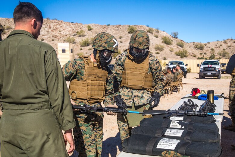 U.S. Marines and Sailors stationed on Marine Corps Air Station (MCAS) Yuma participate in "Operation Backbone" in Yuma, Ariz., Feb. 7, 2019. Operation Backbone is a quarterly unit exercise meant to strengthen the warrior's spirit in the non-commisioned officers (NCOs) and promote cohesion between them. The exercise consisted of a hike with the Headquarters and Headquarters Squadron (H&HS)  commanding officer and acting sergeant major, several classes, and a warriors night. Classes included simulated room clearing training, terrain model training, improvised explosive devices (IED) training, and the Family Advocacy Program on station sent out a representative to talk to the NCOs about leadership. (U.S. Marine Corps photo by Cpl. Isaac D. Martinez)