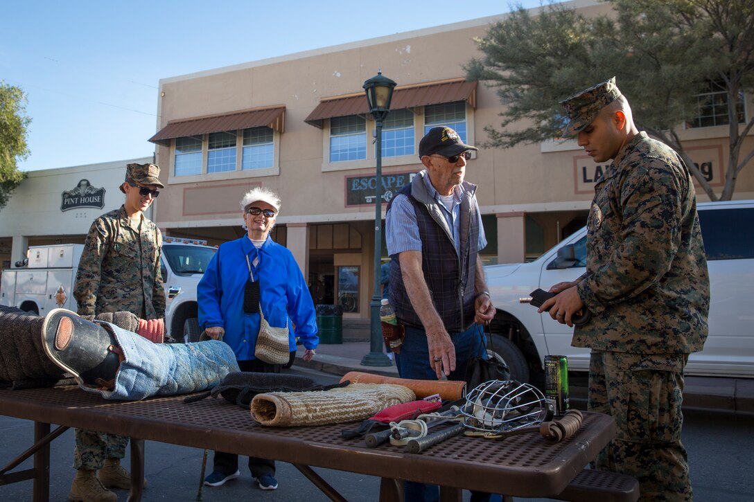 U.S. Marines with Marine Corps Air Station Yuma, conduct a military working dog demonstration during Yuma Military Appreciation Day in Downtown Historic Yuma on Feb. 16, 2019. Military Appreciation Day is held to show the importance of the relationship between the City of Yuma and our service members and veterans. (U.S. Marine Corps photo by Sgt. Allison Lotz)