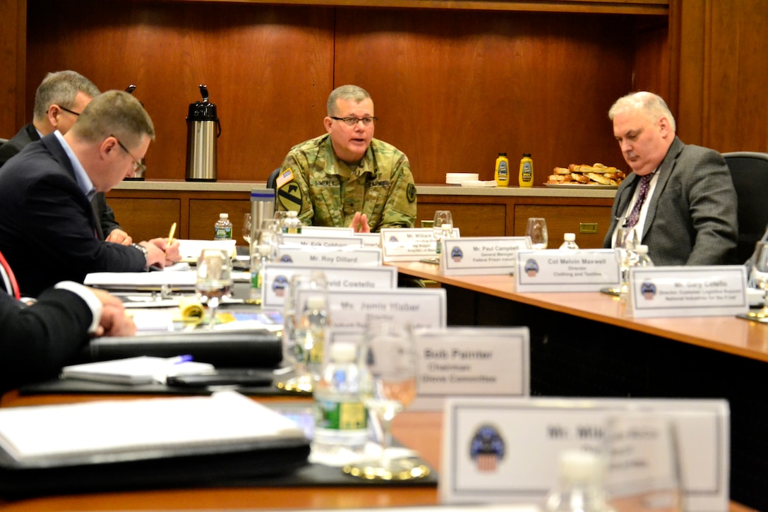 troop support commander meets with American clothing industry