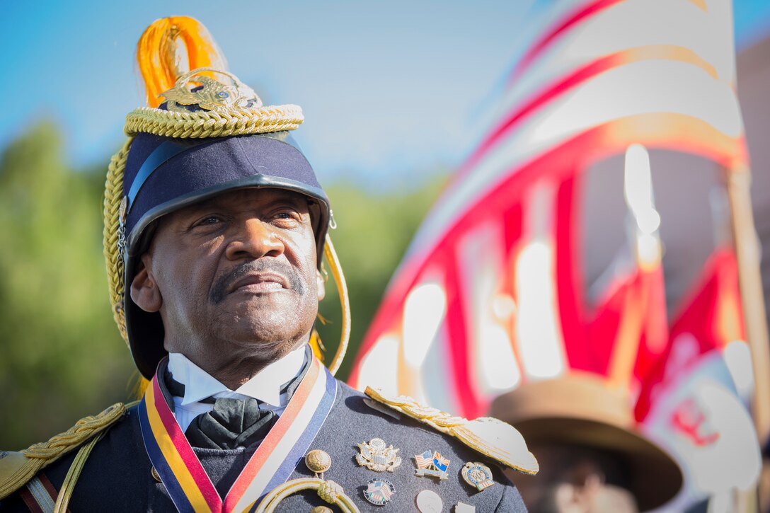 A Civilian with the Buffalo Soldiers of the Arizona Territory and Ladies and Gentlemen of the Regiment pose for a portrait photo during Yuma Military Appreciation Day in Downtown Historic Yuma on Feb. 16, 2019. Military Appreciation Day is held to show the importance of the relationship between the City of Yuma and our service members and veterans. (U.S. Marine Corps photo by Sgt. Allison Lotz)