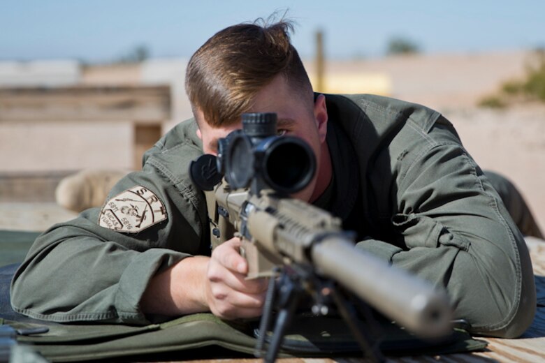 U.S. Marine Corps Cpl. Nathaniel P. Elrod a Military Police Officer with the Provost Marshal's Office (PMO), Headquarters and Headquarters Squadron (H&HS), Marine Corps Air Station (MCAS) Yuma, conducts Special reaction Team (SRT) training on range one Yuma, Ariz., Feb 27, 2019. The SRT is Comprised of military police personnel trained to give an installation commander the ability to counter or contain a special threat situation surpassing normal law enforcement capabilities. (U.S. Marine Corps photo by Lance Cpl. Joel Soriano)