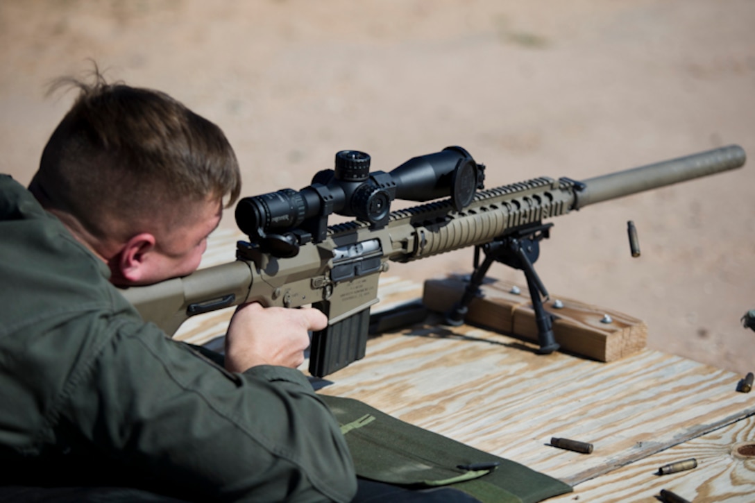 U.S. Marine Corps Cpl. Nathaniel P. Elrod a Military Police Officer with the Provost Marshal's Office (PMO), Headquarters and Headquarters Squadron (H&HS), Marine Corps Air Station (MCAS) Yuma, conducts Special reaction Team (SRT) training on range one Yuma, Ariz., Feb 27, 2019. The SRT is Comprised of military police personnel trained to give an installation commander the ability to counter or contain a special threat situation surpassing normal law enforcement capabilities. (U.S. Marine Corps photo by Lance Cpl. Joel Soriano)