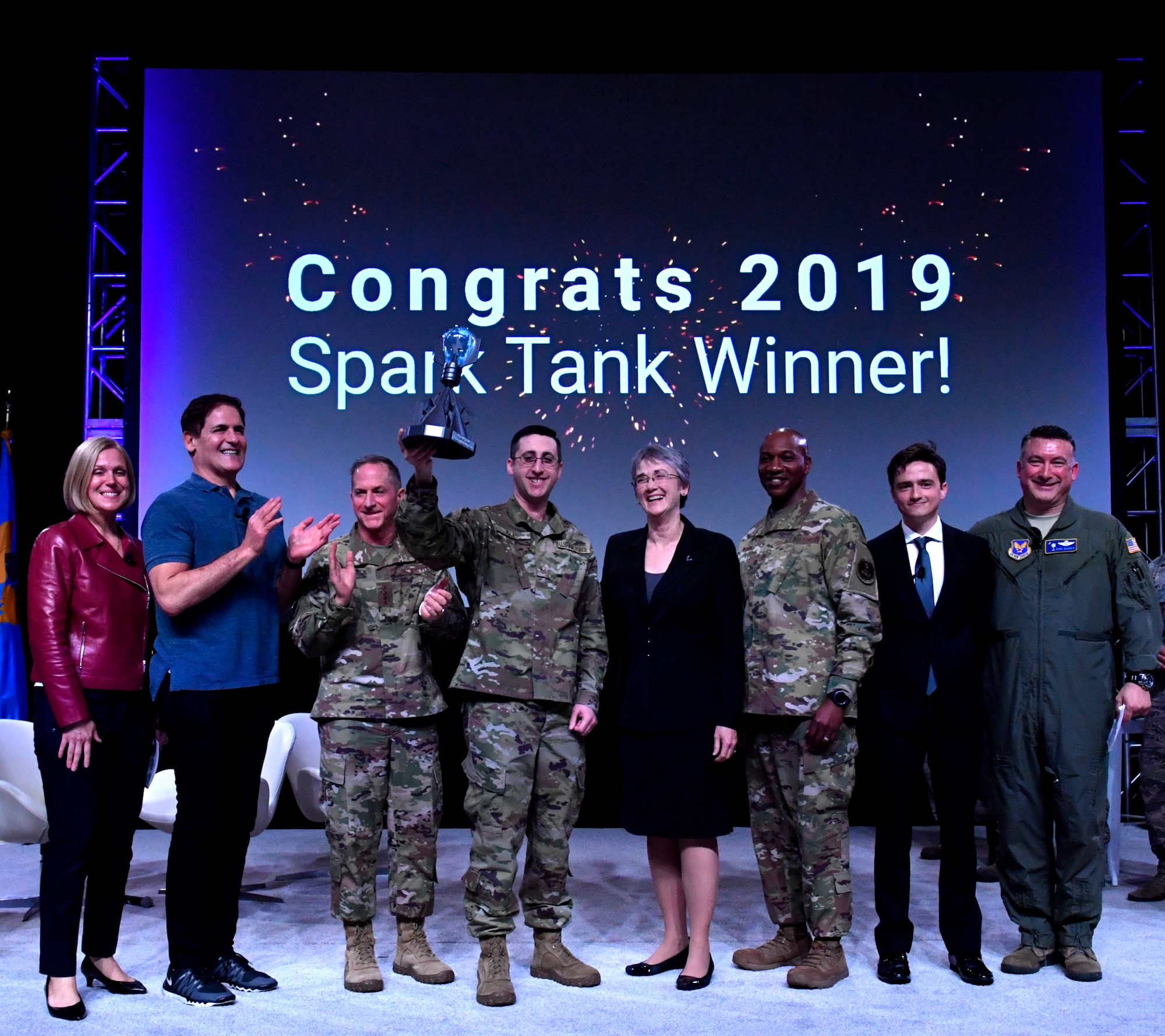 The 2019 Air Force Spark Tank competition judges Secretary of the Air Force Heather Wilson, Air Force Chief of Staff Gen. David L. Goldfein and Chief Master Sgt. of the Air Force Kaleth O. Wright, Mark Cuban and George Steinbrener IV pose for a group photo with the Spark Tank winner during the Air Force Association’s Air Warfare Symposium in Orlando, Florida, Feb. 28, 2019. Spark Tank is a chance to celebrate Air Force risk-takers, idea makers and entrepreneurs who refuse to accept the status quo and have determined their own fate by developing solutions that make it easier for the Air Force to bring the very best to the fight. (U.S. Air Force photo by Wayne Clark)