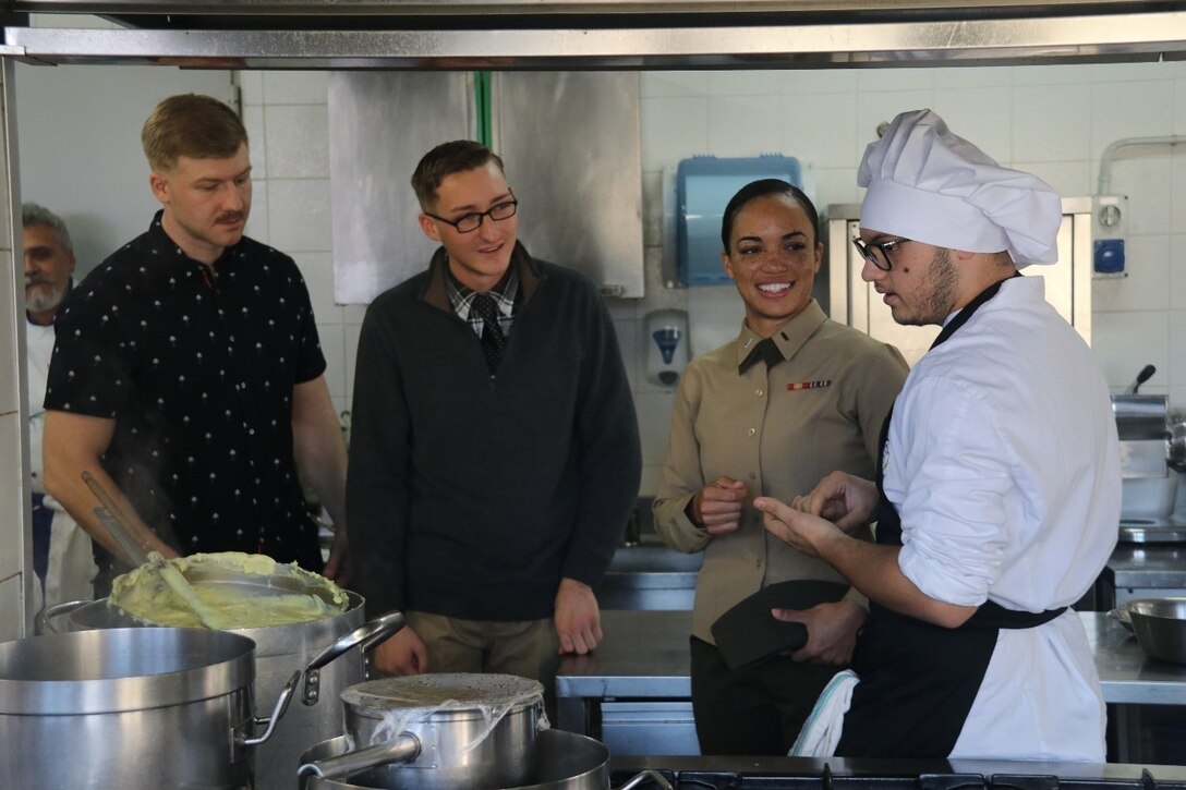 U.S. Marines with Special Purpose Marine Air-Ground Task Force-Crisis Response-Africa 19.1 meet with a student from Istituto Professionale Alberghiero Giovanni Falcone for a language interaction class and a Thanksgiving dinner in Giarre, Italy, Nov. 22, 2018. Marines and Sailors with SPMAGTF-CR-AF strengthen partnerships with the host nation by participating in community relations events during their deployment. SPMAGTF-CR-AF is deployed to conduct crisis-response and theater-security operations in Europe and Africa. (U.S. Marine Corps photo by Lance Cpl. Rodney Scott)