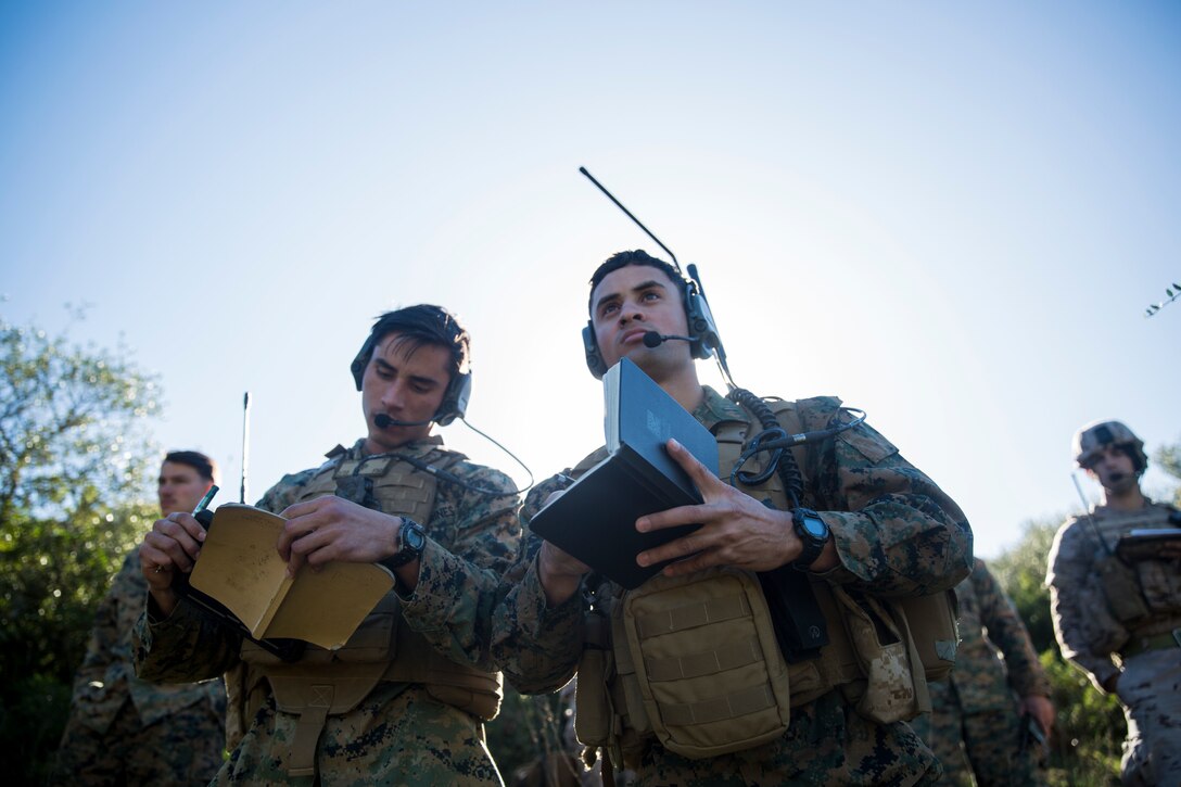 U.S. Marines with Special Purpose Marine Air-Ground Task Force-Crisis Response-Africa practice calling for fire during a close-air-support training event in Sierra De Retin, Spain, Dec. 20, 2018. SPMAGTF-CR-AF is a rotational force deployed to conduct crisis-response and theater-security operations in Europe and Africa. (U.S. Marine Corps photo by Sgt. Katelyn Hunter)