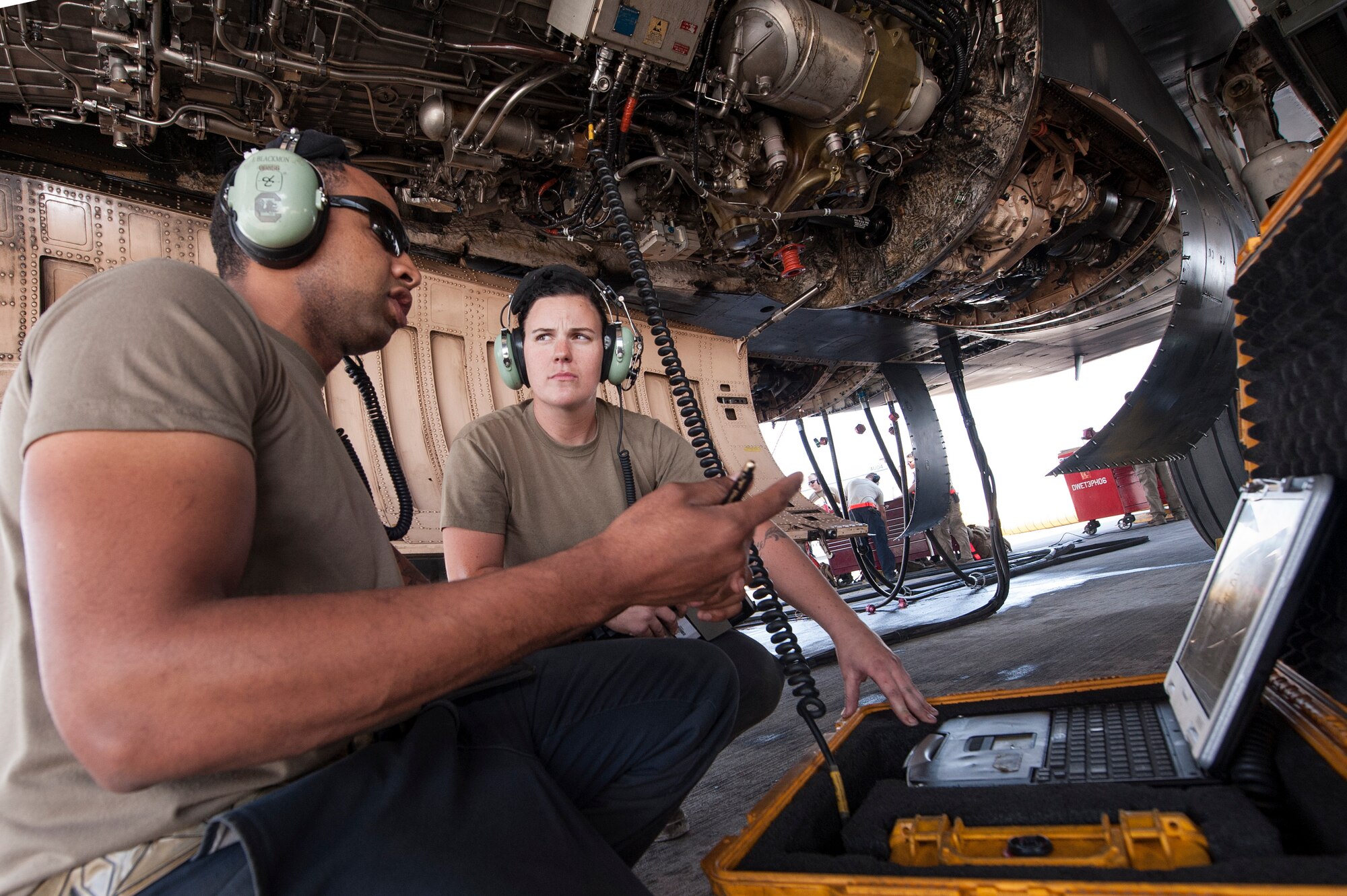 Staff Sgt. Jason Blackmon, left, 379th Expeditionary Aircraft Maintenance Squadron (EAMXS) B-1B Lancer propulsion craftsman, mentors Airman 1st Class Shelby Ries, 379th EAMXS B-1B Lancer propulsion apprentice, while conducting routine maintenance for a B-1B Lancer Dec. 22, 2018, at Al Udeid Air Base, Qatar. Ries was selected to deploy to Al Udeid as an advanced echelon (ADVON) team member. Ries led two engine changes and more than 90 maintenance actions which resulted in 56 B-1B sorties, totaling 672 flying hours. (U.S. Air Force photo by Tech. Sgt. Christopher Hubenthal)