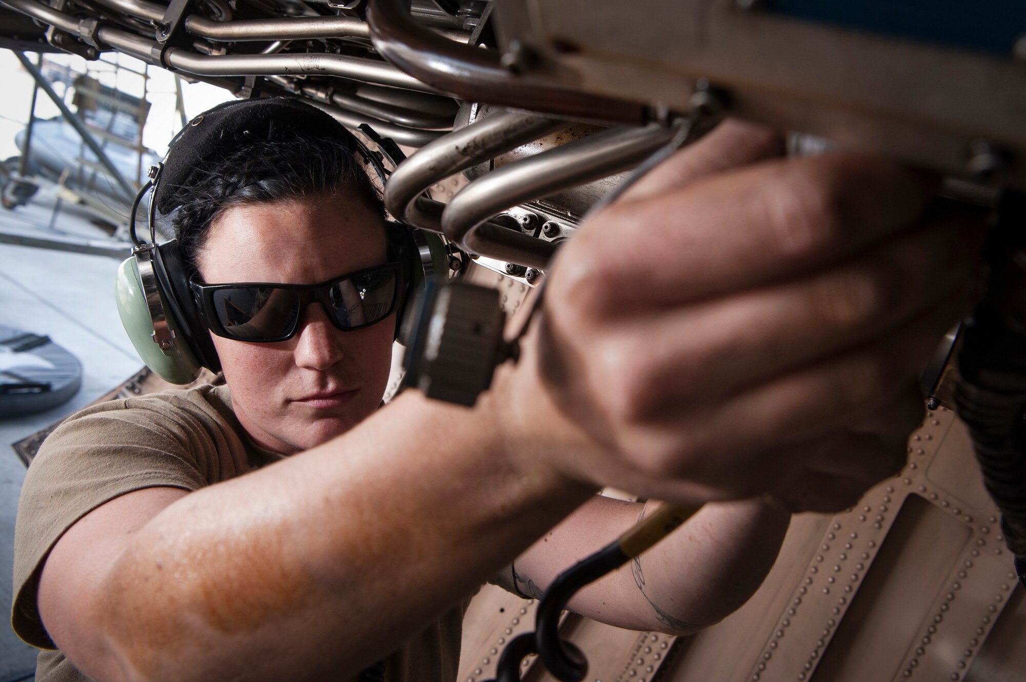 Airman 1st Class Shelby Ries, 379th Expeditionary Aircraft Maintenance Squadron (EAMXS) B-1B Lancer propulsion apprentice, conducts routine maintenance for a B-1B Lancer Dec. 22, 2018, at Al Udeid Air Base, Qatar. Due to Ries’s exceptional performance she was selected to deploy to Al Udeid as an area of responsibility (AOR) advanced echelon (ADVON) team member. Ries led two engine changes and more than 90 maintenance actions which resulted in 56 B-1B sorties, totaling 672 flying hours. (U.S. Air Force photo by Tech. Sgt. Christopher Hubenthal)
