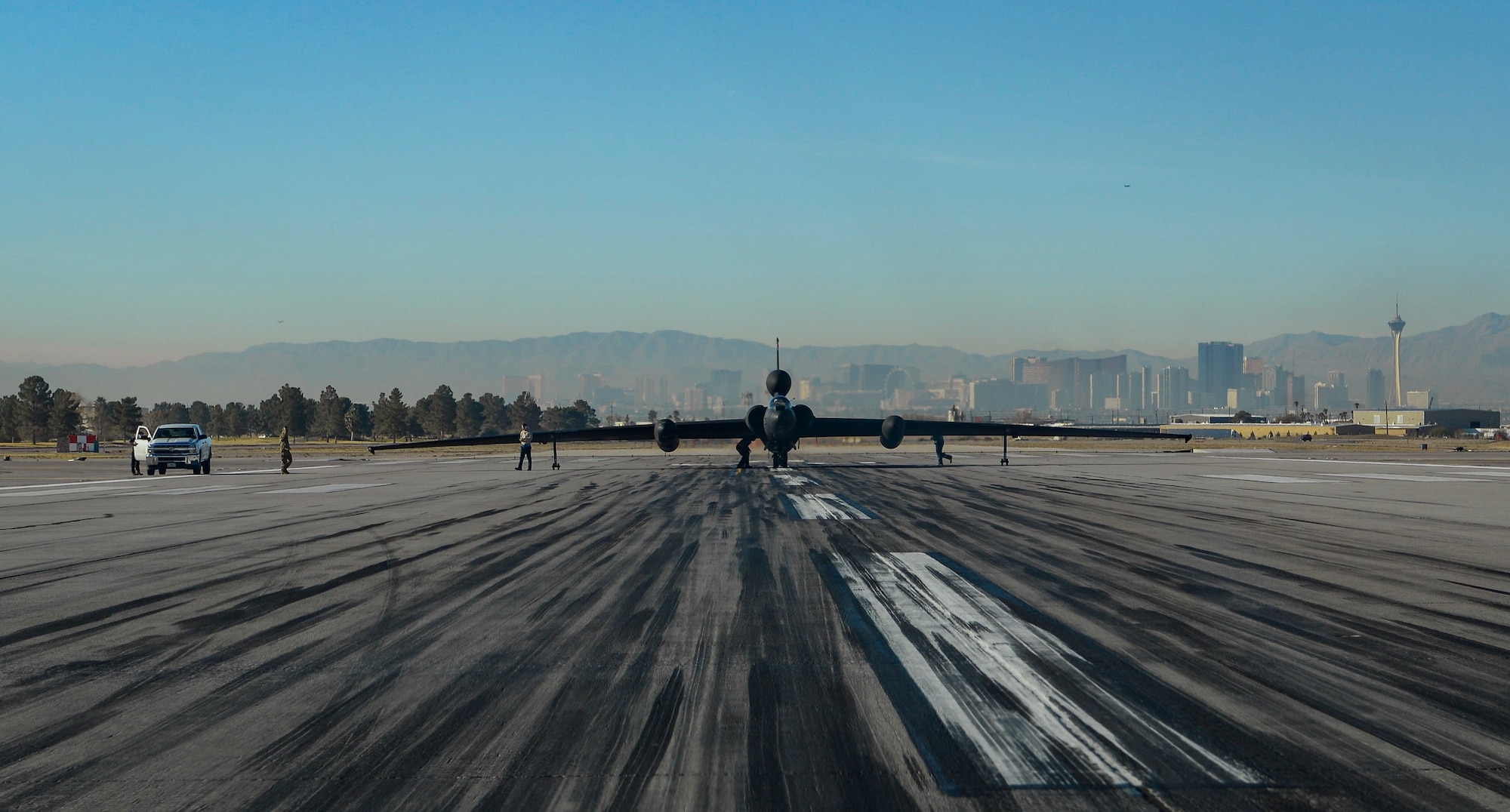 An aircraft sits on the runway before take off.