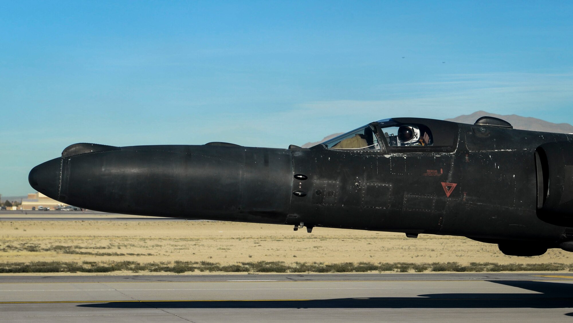 A U-2 aircraft sits on a flight line.