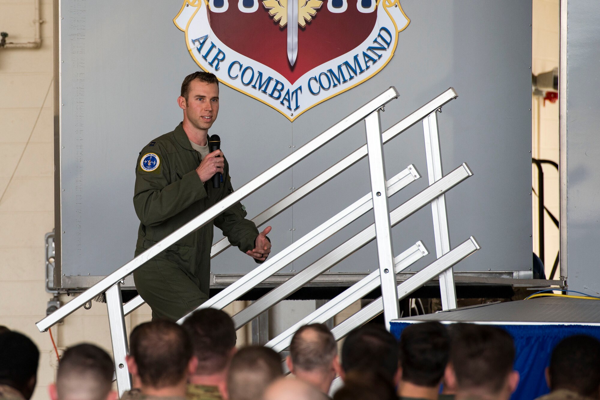 Capt. Adam Cade, 23d WG chief of flight safety, briefs Team Moody Airmen during a flight safety meeting, Jan. 2, 2019, at Moody Air Force Base, Ga. Team Moody started the New Year with a clean slate by picking up debris off the flightline this morning, ensuring a safe runway for training and deploying warriors throughout the year. We also had the honor of hearing guest speaker Bernie McGrenahan, a comedian with a powerful training and prevention-based session at the end of his show. Thank you to the Wing Safety Office for putting this day together and starting the year off right! (U.S. Air Force photo by Airman 1st Class Erick Requadt)