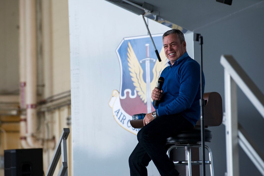 Bernie McGrenahan, comedian, performs stand-up comedy during a safety briefing, Jan. 2, 2019, at Moody Air Force Base, Ga. Team Moody started the New Year with a clean slate by picking up debris off the flightline this morning, ensuring a safe runway for training and deploying warriors throughout the year. We also had the honor of hearing guest speaker Bernie McGrenahan, a comedian with a powerful training and prevention-based session at the end of his show. Thank you to the Wing Safety Office for putting this day together and starting the year off right! (U.S. Air Force photo by Airman 1st Class Erick Requadt)