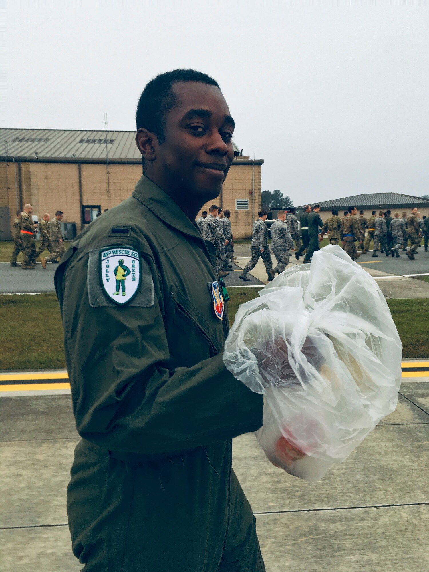A Team Moody Airman poses for a photo during a foreign object debris (FOD) walk, Jan. 2, 2019, at Moody Air Force Base, Ga. Team Moody started the New Year with a clean slate by picking up debris off the flightline this morning, ensuring a safe runway for training and deploying warriors throughout the year. We also had the honor of hearing guest speaker Bernie McGrenahan, a comedian with a powerful training and prevention-based session at the end of his show. Thank you to the Wing Safety Office for putting this day together and starting the year off right! (U.S. Air Force photo by Airman 1st Class Erick Requadt)