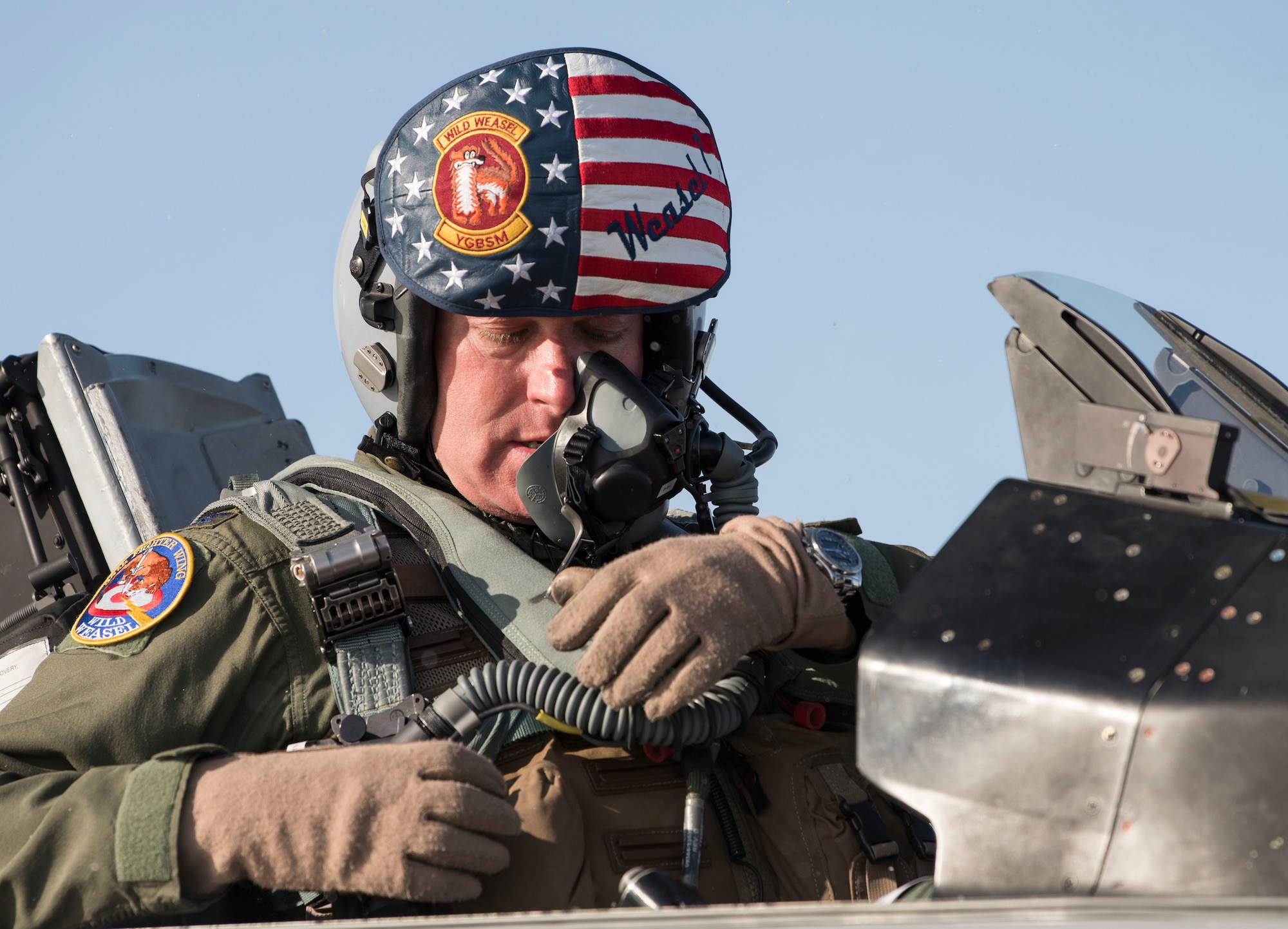 U.S. Air Force Col. Kristopher Struve, the 35th Fighter Wing commander, strap into an F-16 Fighting Falcon at Misawa Air Base, Japan, Dec. 28, 1018. Struve is a seasoned F-16 Fighting Falcon pilot with more than 2,500 flying hours. He also commanded the 13th Fighter Squadron from June 2015 to July 2016 and led them in the opening days of operations reentering Iraq and into Syria as part of OPERATION INHERENT RESOLVE. (U.S. Air Force photo by Staff Sgt. B.A. Chase)