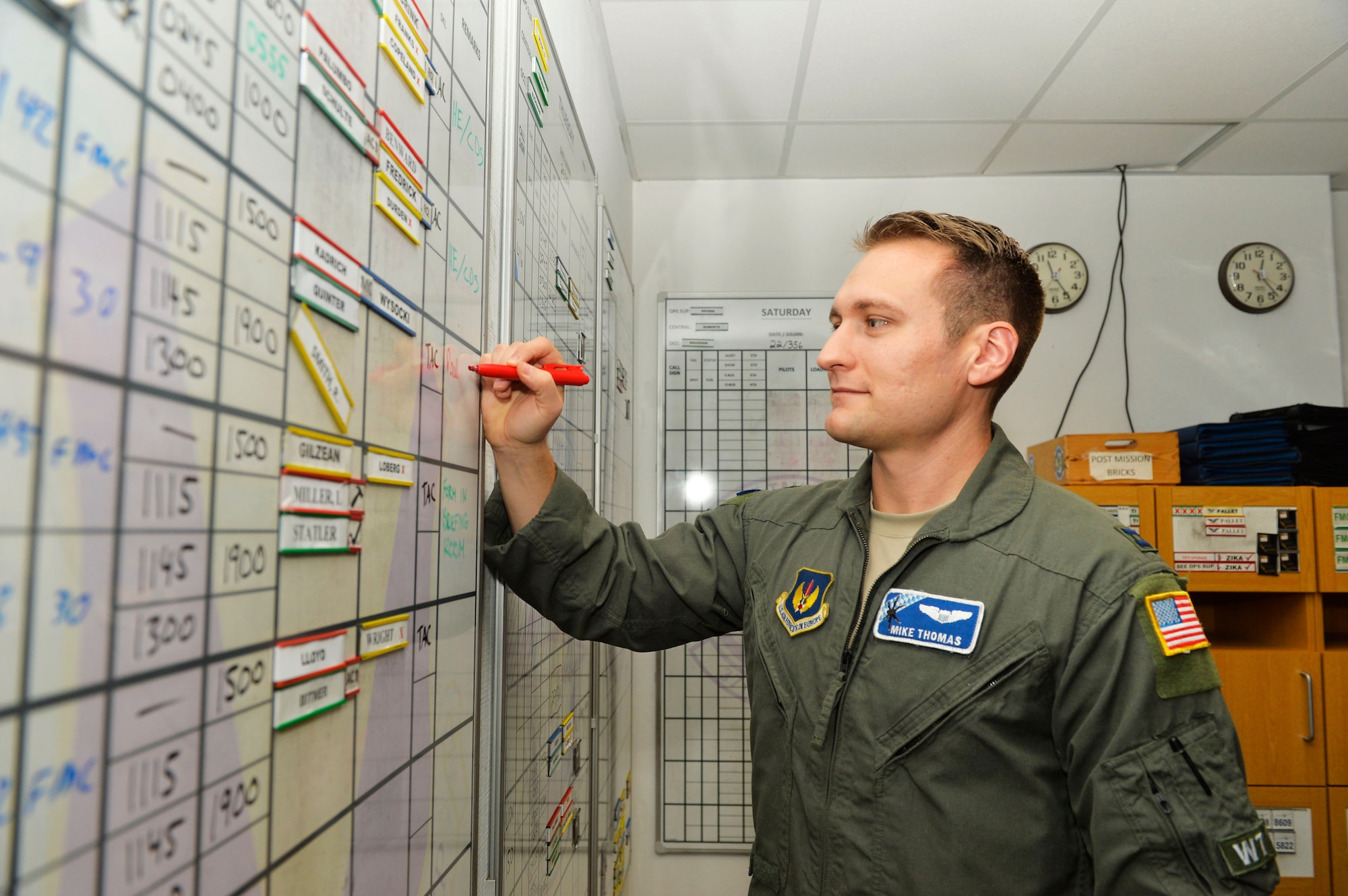 U.S. Air Force Capt. Mike Thomas, 37th Airlift Squadron central scheduler, reviews his unit’s flight schedule on Ramstein Air Base, Germany, Dec. 19, 2018. The 37th AS always has a team on standby to respond to missions any time of the year. (U.S. Air Force photo by Senior Airman Joshua Magbanua)