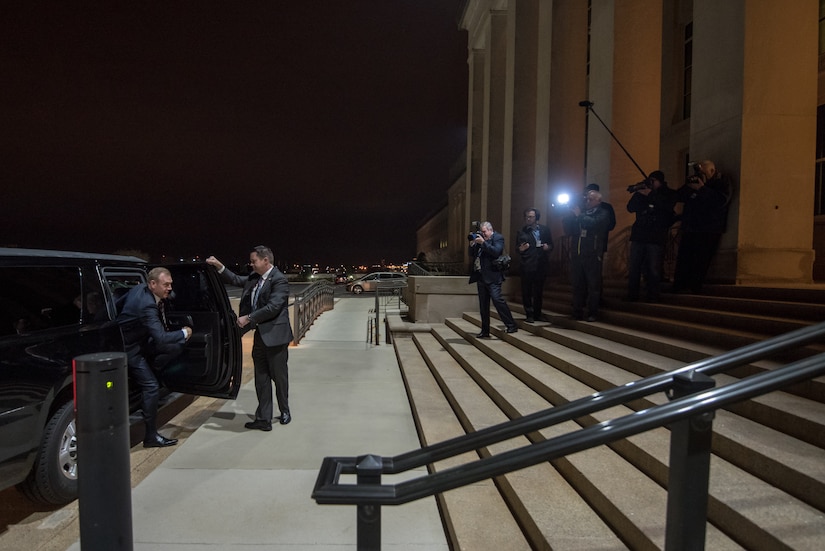 Acting defense secretary steps out of car upon arroival at Pentagon.