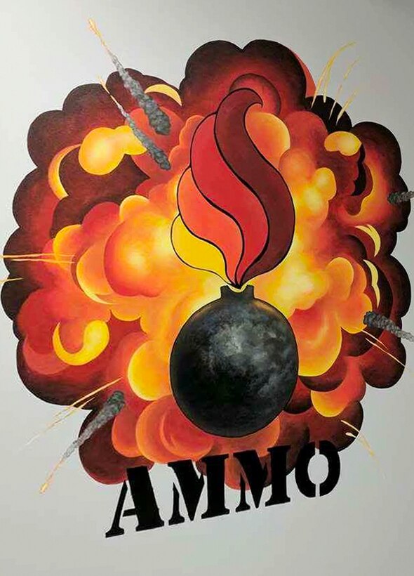 A mural created by U.S. Air Force Staff Sgt. Ashley Johnson, a munitions technician assigned to the 707th maintenance squadron, decorates the walls of the 307th Maintenance Squadron munitions flight building at Barksdale Air Force Base, Louisiana.  Since becoming a Reserve Citizen Airman, Johnson has created several different designs for units around the 307th Bomb Wing.  (courtesy photo)