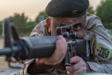 An Iraqi soldier conducts a dime/washer drill as part of a primary marksmanship instruction course held at Camp Taji, Iraq, Dec.19, 2018. The course is taught by Task Force India Bravo, a unit comprised of Soldiers from 1st Squadron, 98th Cavalry Regiment, 106th Support Battalion and 2nd Battalion, 114th Field Artillery Regiment, 155th Armored Brigade Combat Team, Mississippi Army National Guard, and is tasked with training the Iraqi 9th Armor Division. This Task Force is deployed in support of Combined Joint Task Force – Operation Inherent Resolve, working with the Iraqi Security Forces to develop a sustainable and inclusive force that can secure its sovereign borders, protect the population, and ensure the lasting defeat of ISIS.