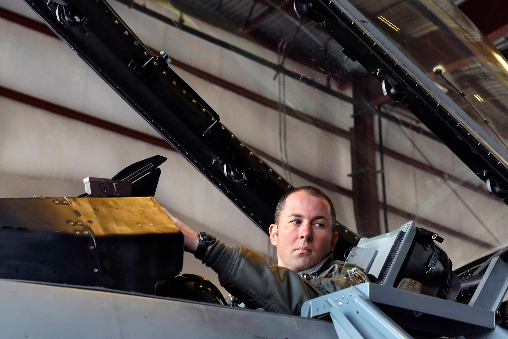 Air Force Lt. Col. Jason Halvorsen, a pilot with the District of Columbia Air National Guard's Aerospace Control Alert Detachment, goes through a pre-flight check in an F-16 Fighting Falcon aircraft during a training event at Joint Base Andrews, Maryland, Dec. 19, 2018.  Halvorsen is one of several pilots with the detachment, which is tasked with keeping the Washington, D.C., area safe from airborne threats. The ACAD has responded to more than 6,200 alert events since its formation in the aftermath of the 9/11 attacks.