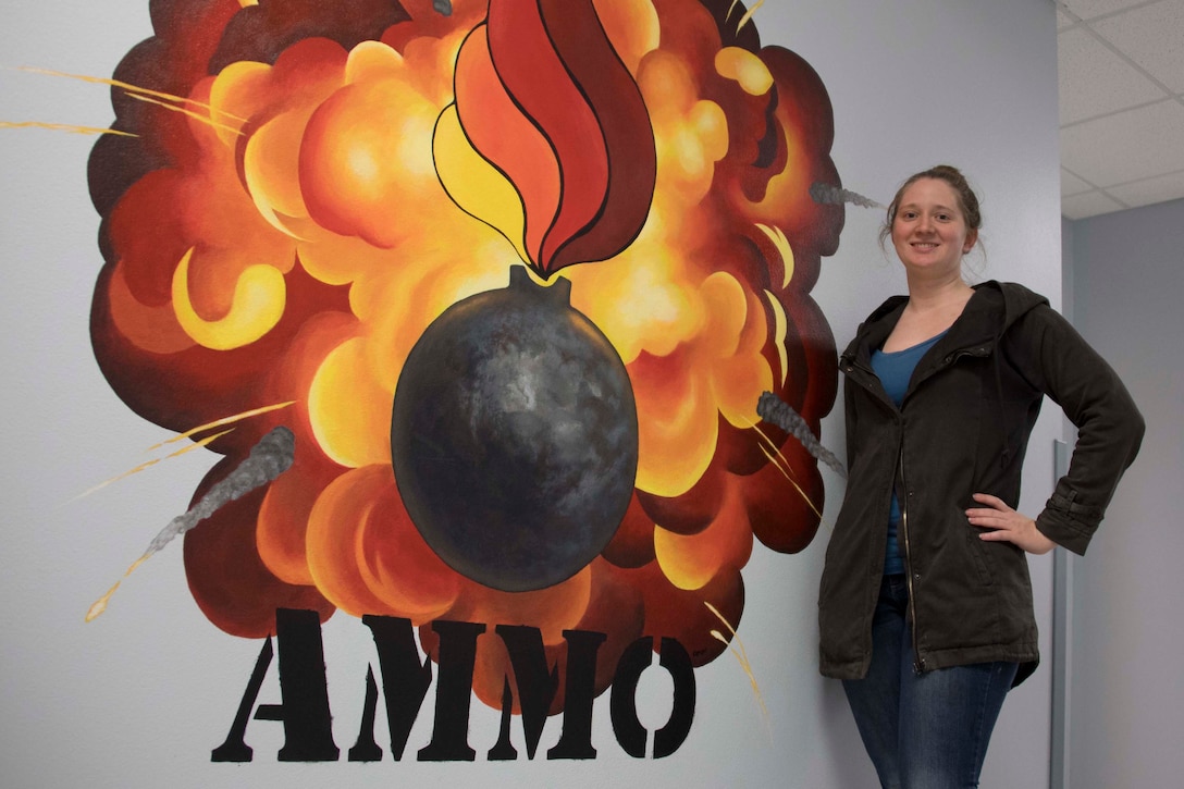 A mural created by U.S. Air Force Staff Sgt. Ashley Johnson, a munitions technician assigned to the 707th maintenance squadron, decorates the walls of the 307th Maintenance Squadron munitions flight building at Barksdale Air Force Base, Louisiana.  Since becoming a Reserve Citizen Airman, Johnson has created several different designs for units around the 307th Bomb Wing.  (U.S. Air Force photo by Master Sgt. Ted Daigle)