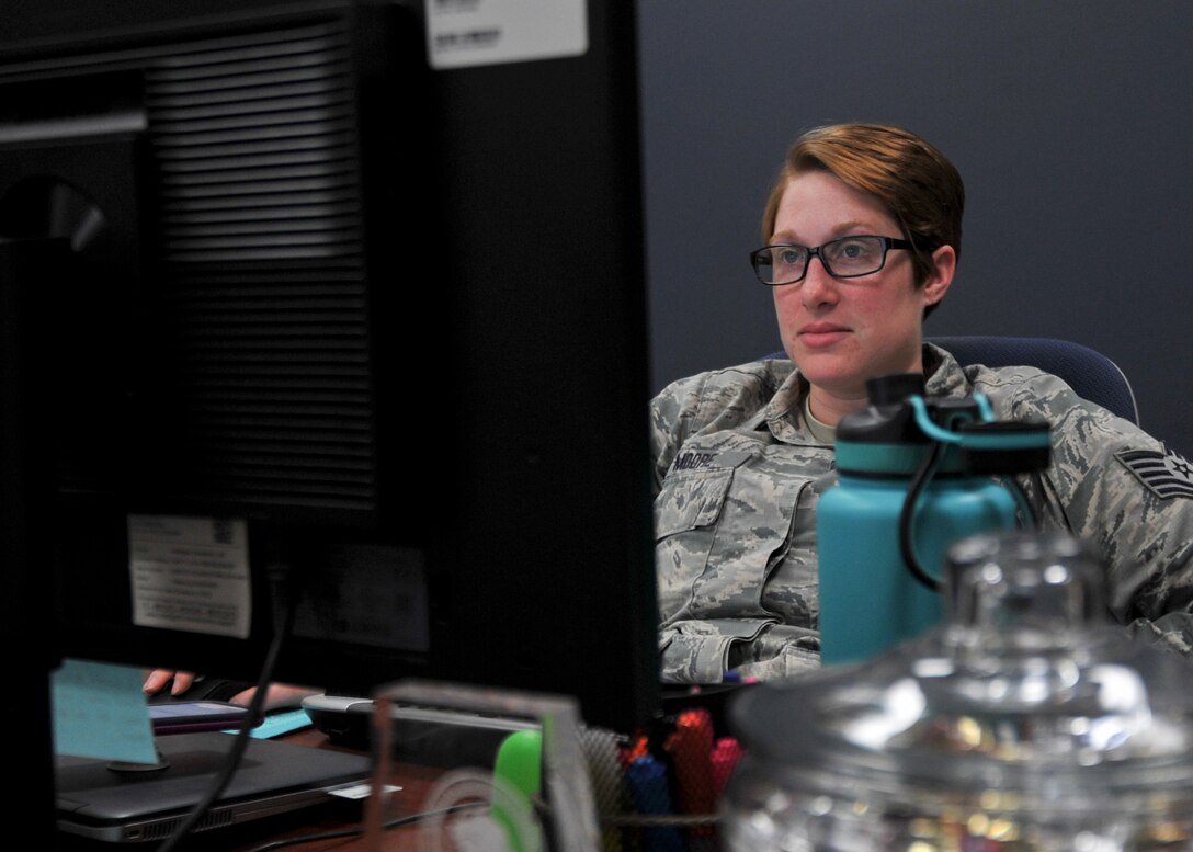 Tech. Sgt. Brandi Moore, a pest management helper assigned to the 910th Airlift Wing, works in her office at the wing headquarters building at Youngstown Air Reserve Station, Jan. 4, 2019. Moore is also in charge of YARS's Development and Training Flight as a special duty.