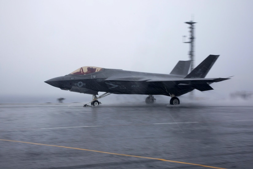 An F-35C takes off from an aircraft carrier.