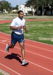 Tech. Sgt. Maurice Monroe, Air Force Manpower Analysis Agency Training Management Branch manager, runs laps during his lunch at the Rambler Fitness Center track, Joint Base San Antonio-Randolph, Texas, Jan. 3, 2018. Monroe uses exercise as a stress reliever and to improve his overall fitness