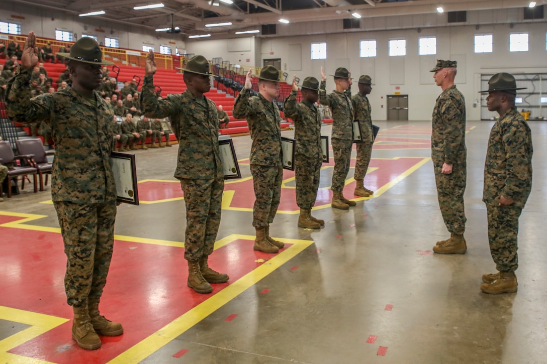 Drill instructors are meritoriously promoted at the All-Weather Training Facility on Marine Corps Recruit Depot Parris Island, S.C. January 2, 2019. The drill instructors were meritoriously promoted to the next rank by Brig. Gen. James F. Glynn, commanding general, and Depot Sergeant Major, Sgt. Maj. William C. Carter. (U.S. Marine Corps photo by Lance Cpl. Shane T. Manson)