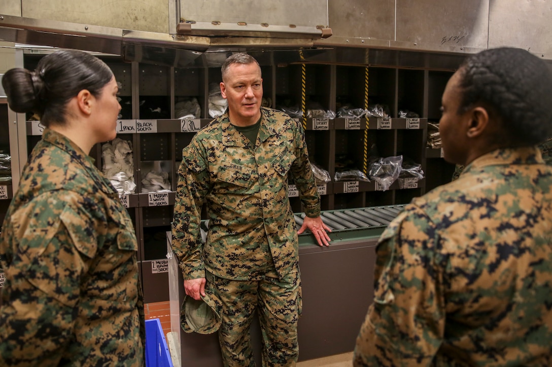 Brig. Gen. William H. Swan tours the recruit receiving building at Marine Corps Recruit Depot Parris Island, Jan. 3, 2019. Swan toured the base before acting as the Parade Reviewing Official for the graduation of Golf Company, 2nd Recruit Training Battalion.