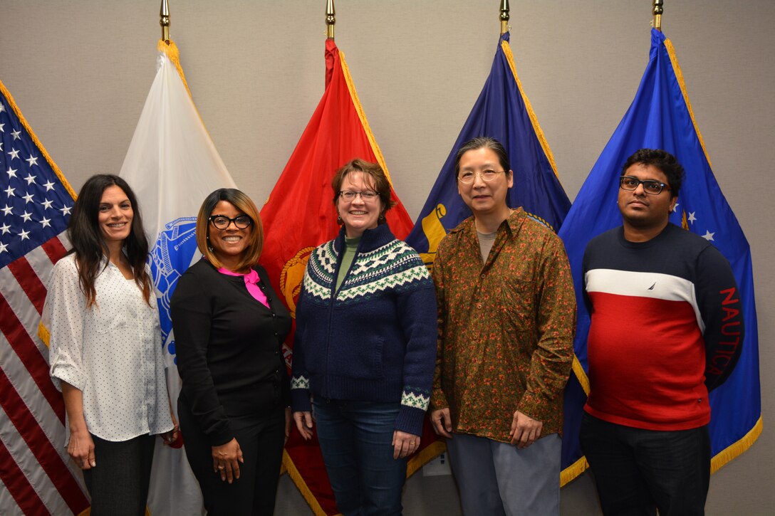 Defense Masters club members pose for photo