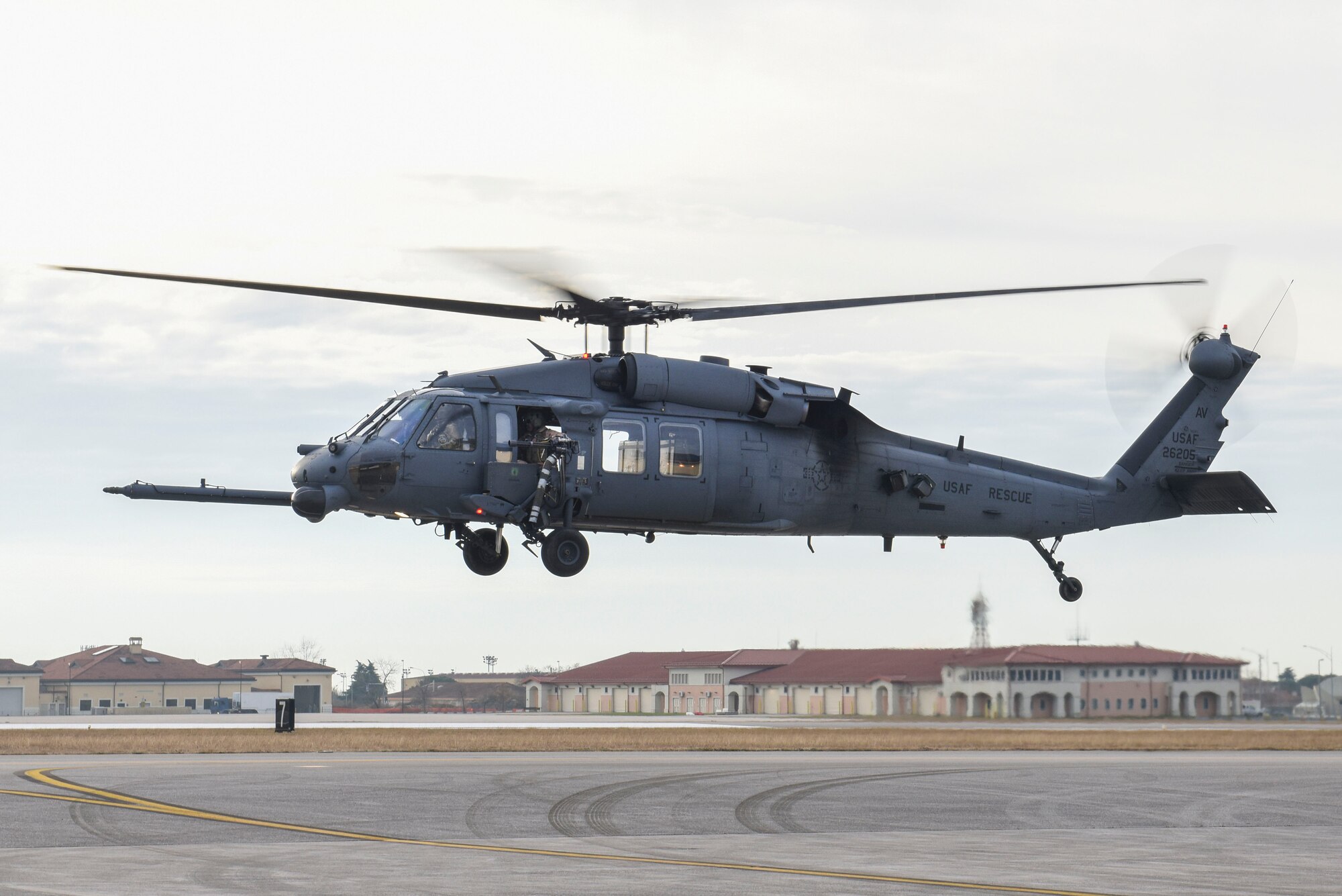 An HH-60G Pave Hawk helicopter assigned to the 56th Rescue Squadron departs from the flightline at Aviano Air Base, Italy, Dec. 17, 2018. The 56th Rescue Squadron provides a rapidly-deployable, worldwide combat rescue and reaction force response utilizing HH-60G Pave Hawk helicopters.