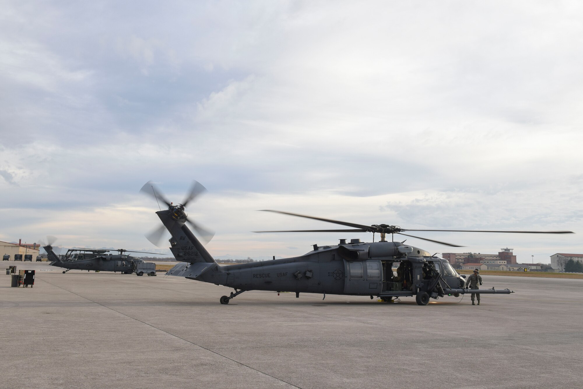 Airmen with the 56th Rescue Squadron prepare HH-60G Pave Hawk helicopters fore takeoff at Aviano Air Base, Italy, Dec. 17, 2018. The 56th Rescue Squadron provides a rapidly-deployable, worldwide combat rescue and reaction force response utilizing HH-60G Pave Hawk helicopters.