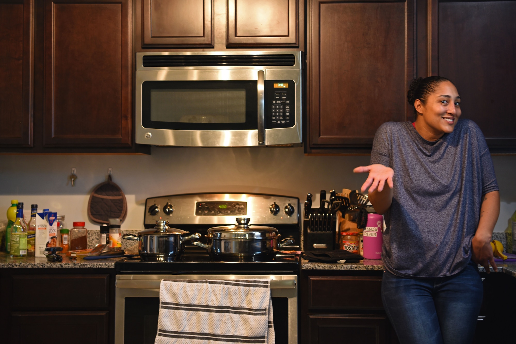 U.S. Air Force Tech. Sgt. Ashley Grugin, 20th Aircraft Maintenance Squadron unit fitness program manager, discusses her passion for cooking at her residence in Sumter, S.C., Dec. 16, 2018.