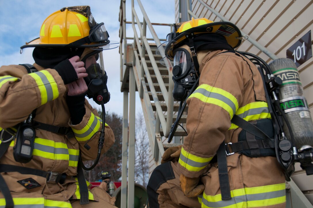 104th Civil Engineering Squadron firefighters conduct live structural fire training Nov. 27, 2018, at Barnes Air National Guard Base, Massachusetts. The training ensures the Fire Attack Teams are prepared to respond to any fires on base or in the surrounding communities. (U.S. Air National Guard photo by Airman 1st Class Randy Burlingame)