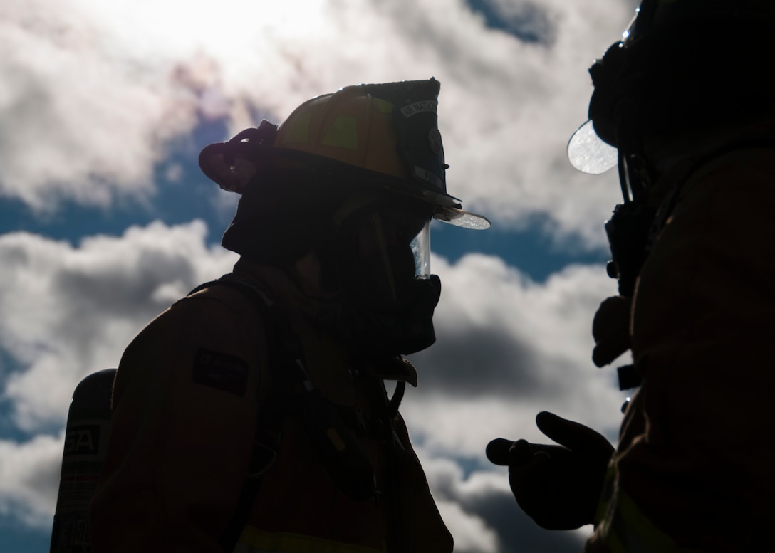 104th Civil Engineering Squadron firefighters conduct live structural fire training Nov. 27, 2018, at Barnes Air National Guard Base, Massachusetts. The training ensures the Fire Attack Teams are prepared to respond to any fires on base or in the surrounding communities. (U.S. Air National Guard photo by Airman 1st Class Randy Burlingame)