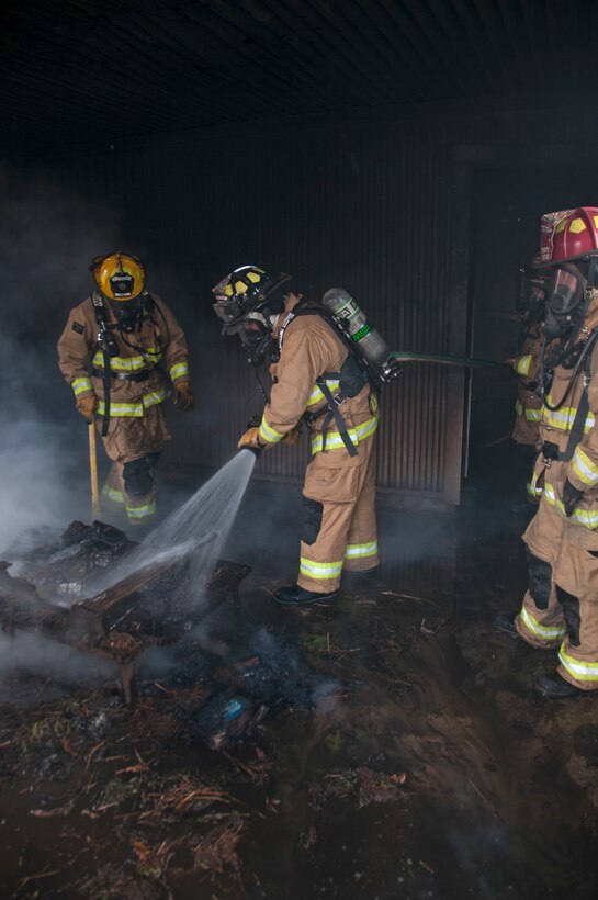 104th Civil Engineering Squadron firefighters conduct live structural fire training Nov. 27, 2018, at Barnes Air National Guard Base, Massachusetts. The training ensures the Fire Attack Teams are prepared to respond to any fires on base or in the surrounding communities. (U.S. Air National Guard photo by Airman 1st Class Randy Burlingame)