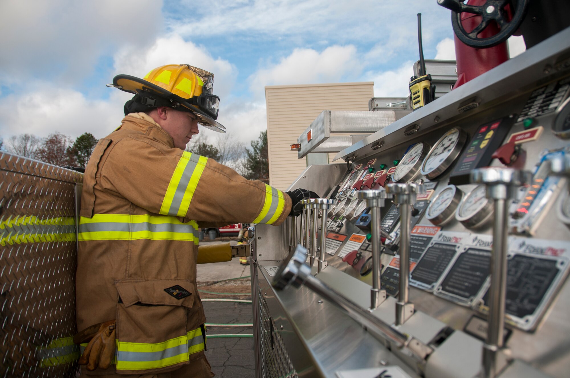 Senior Airman Dylan Nygren, 104th Civil Engineering Squadron firefighter, participates in live structural fire training Nov. 27, 2018, at Barnes Air National Guard Base, Massachusetts. The training ensures the Fire Attack Teams are prepared to respond to any fires on base or in the surrounding communities. (U.S. Air National Guard photo by Airman 1st Class Randy Burlingame)