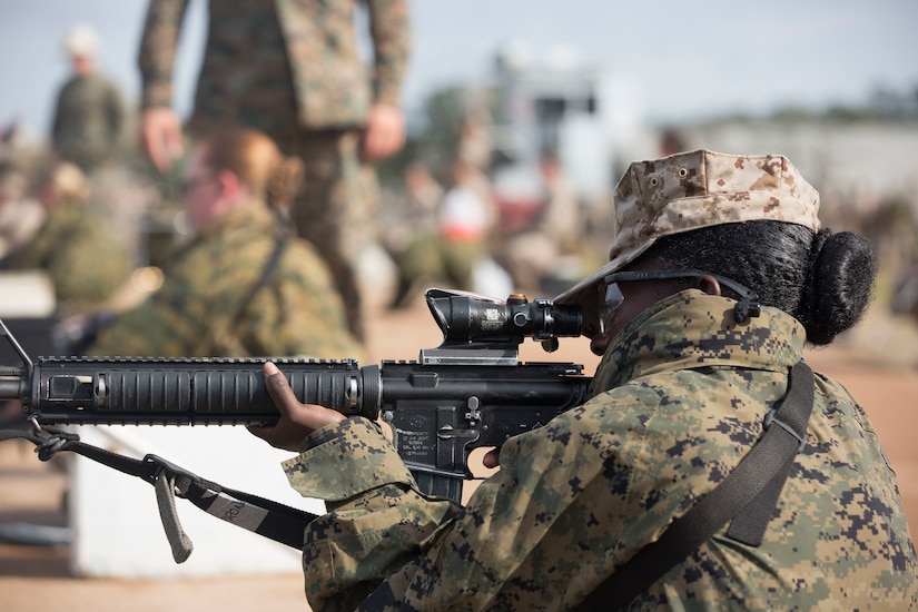 A Marine Corps recruit uses a weapons range.