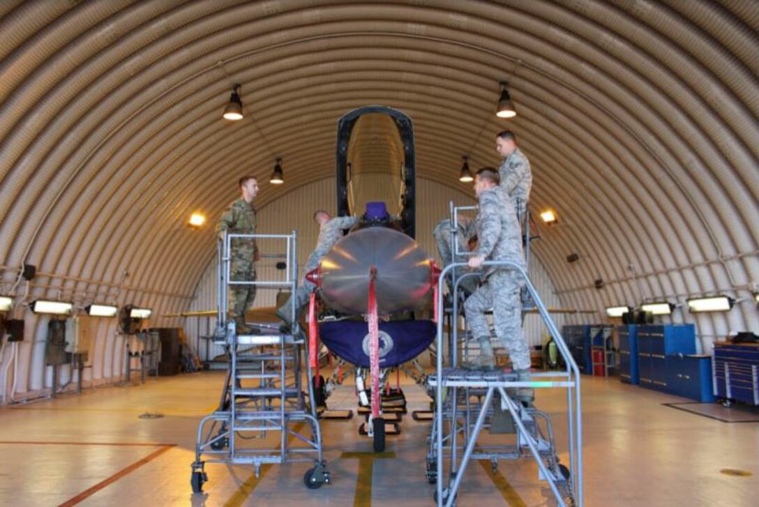 Egress Technicians from the 31st Maintenance Group, Aviano Air Base Italy, prepare a U.S. Air Force F-16 Falcon for Aviano's first "Super Raise" procedure, October 2, 2018. (U.S. Air Force Courtesy Photo)